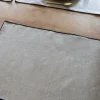 Individual De Lino Impermeable Beige Con Borde Negro