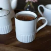 Taza De Porcelana Blanca Con Filo Negro